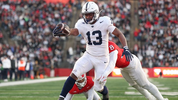 Nov 29, 2025; Piscataway, New Jersey, USA; Penn State Nittany Lions running back Kaytron Allen (13) scores a rushing touchdown during the first half against the Rutgers Scarlet Knights at SHI Stadium. Mandatory Credit: Vincent Carchietta-Imagn Images Nov 29, 2025; Piscataway, New Jersey, USA; Penn State Nittany Lions running back Kaytron Allen (13) scores a rushing touchdown during the first half against the Rutgers Scarlet Knights at SHI Stadium. Mandatory Credit: Vincent Carchietta-Imagn Images