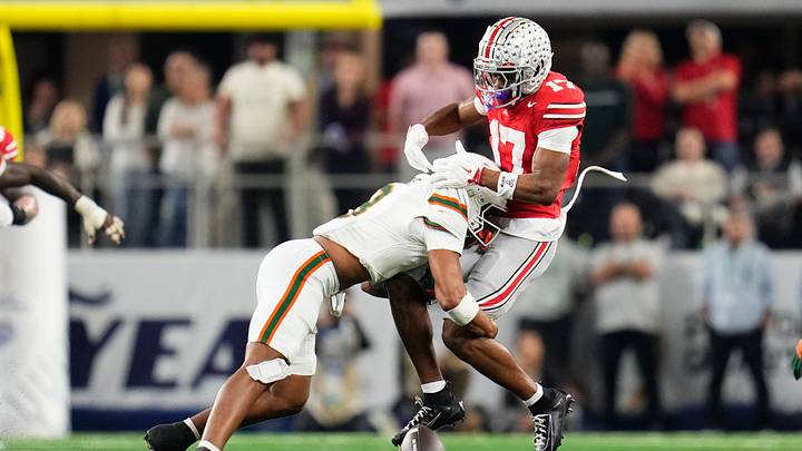 Miami Hurricanes defensive back Jakobe Thomas (8) forces an incomplete pass intended for Ohio State Buckeyes wide receiver Carnell Tate (17) during the Cotton Bowl at AT&T Stadium in Arlington, Texas for the College Football Playoff quarterfinal game on Dec. 31, 2025. Ohio State lost 24-14.