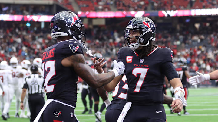 Dec 14, 2025; Houston, Texas, USA; Houston Texans wide receiver Nico Collins (12) and quarterback C.J. Stroud (7) celebrate a touchdown during the fourth quarter against the Arizona Cardinals at NRG Stadium. Mandatory Credit: Troy Taormina-Imagn Images