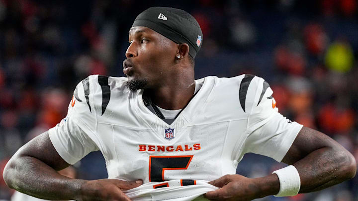 Cincinnati Bengals wide receiver Tee Higgins (5) walks for the locker room after the fourth quarter of the NFL Week 4 Monday Night Football game between the Denver Broncos and the Cincinnati Bengals at Empower Field at Mile High in Denver on Monday, Sept. 29, 2025. The Bengals fell to 2-2 with a 28-3 loss to the Broncos. Cincinnati Bengals wide receiver Tee Higgins (5) walks for the locker room after the fourth quarter of the NFL Week 4 Monday Night Football game between the Denver Broncos and the Cincinnati Bengals at Empower Field at Mile High in Denver on Monday, Sept. 29, 2025. The Bengals fell to 2-2 with a 28-3 loss to the Broncos.