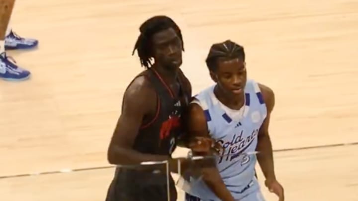 Marcus Gillespie and  Moustapha Diop pushing and shoving during the ball being inbounded. 