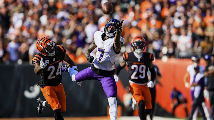 Oct 6, 2024; Cincinnati, Ohio, USA; Baltimore Ravens wide receiver Rashod Bateman (7) attempts to catch a pass against Cincinnati Bengals safety Vonn Bell (24) in the second half at Paycor Stadium. Mandatory Credit: Katie Stratman-Imagn Images