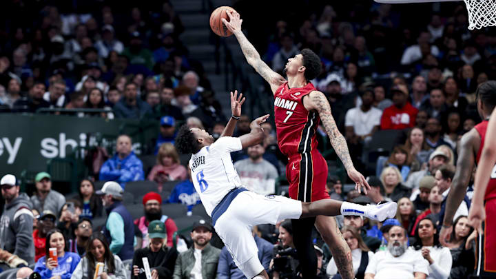 Feb 13, 2025; Dallas, Texas, USA; Miami Heat center Kel'el Ware (7) blocks teh shot of Dallas Mavericks forward Olivier-Maxence Prosper (8) during the second half at American Airlines Center. Mandatory Credit: Kevin Jairaj-Imagn Images Feb 13, 2025; Dallas, Texas, USA; Miami Heat center Kel'el Ware (7) blocks teh shot of Dallas Mavericks forward Olivier-Maxence Prosper (8) during the second half at American Airlines Center. Mandatory Credit: Kevin Jairaj-Imagn Images