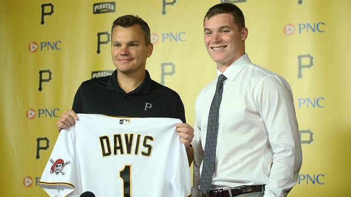 Jul 18, 2021; Pittsburgh, Pennsylvania, USA;  Pittsburgh Pirates general manager Ben Cherington (left) introduces catcher Henry Davis (right) who was selected number one overall in the 2021 MLB first year player draft by the Pirates at a news conference before the Pirates play the New York Mets at PNC Park. Mandatory Credit: Charles LeClaire-Imagn Images