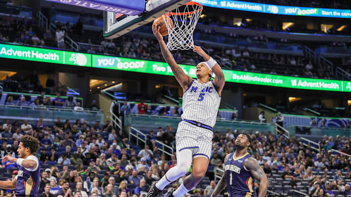 Oct 16, 2025; Orlando, Florida, USA; Orlando Magic forward Paolo Banchero (5) lays up during the first quarter against the New Orleans Pelicans at Kia Center. Mandatory Credit: Mike Watters-Imagn Images Oct 16, 2025; Orlando, Florida, USA; Orlando Magic forward Paolo Banchero (5) lays up during the first quarter against the New Orleans Pelicans at Kia Center. Mandatory Credit: Mike Watters-Imagn Images