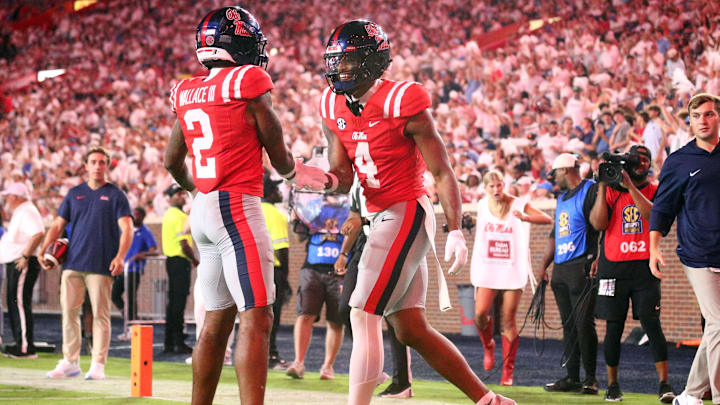Aug 30, 2025; Oxford, Mississippi, USA; Mississippi Rebels tight end Caleb Odom (4) reacts with wide receiver Harrison Wallace III (2) after a touchdown during the third quarter against the Georgia State Panthers at Vaught-Hemingway Stadium. Mandatory Credit: Petre Thomas-Imagn Images Aug 30, 2025; Oxford, Mississippi, USA; Mississippi Rebels tight end Caleb Odom (4) reacts with wide receiver Harrison Wallace III (2) after a touchdown during the third quarter against the Georgia State Panthers at Vaught-Hemingway Stadium. Mandatory Credit: Petre Thomas-Imagn Images