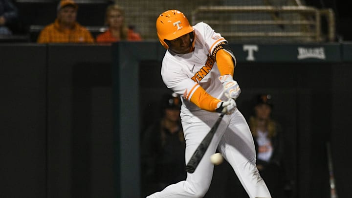 Tennessee's Christian Moore (1) hits the ball during a NCAA baseball game at Lindsey Nelson Stadium