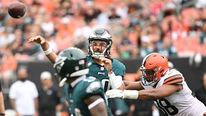 Aug 21, 2022; Cleveland, Ohio, USA; Philadelphia Eagles quarterback Gardner Minshew (10) throws a pass as Cleveland Browns defensive end Isaac Rochell (98) defends during the first half at FirstEnergy Stadium. Mandatory Credit: Ken Blaze-Imagn Images