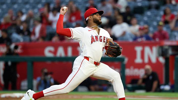 Aug 13, 2026; Anaheim, California, USA;  Los Angeles Angels pitcher Walbert Urena (57) pitches during the second inning against the Texas Rangers at Angel Stadium. Mandatory Credit: Kiyoshi Mio-Imagn Images