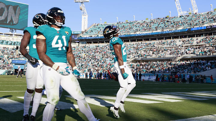 Dec 31, 2023; Jacksonville, Florida, USA;  Jacksonville Jaguars safety Antonio Johnson (26) and OLB Josh Allen (41) at EverBank Stadium. Mandatory Credit: Morgan Tencza-USA TODAY Sports