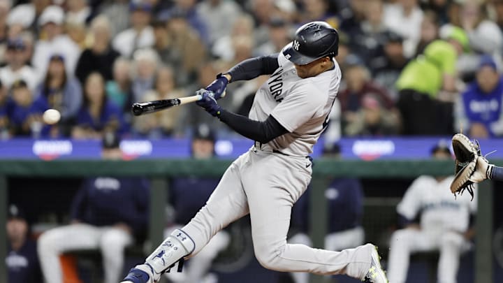 Sep 18, 2024; Seattle, Washington, USA; New York Yankees right fielder Juan Soto (22) hits a double against the Seattle Mariners during the third inning at T-Mobile Park.