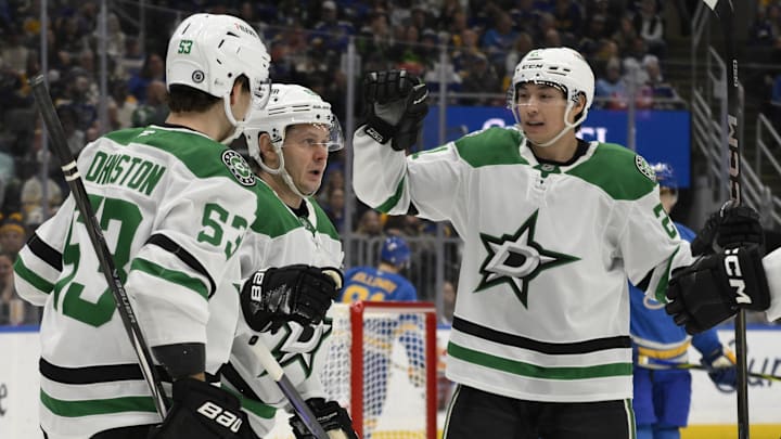 Jan 25, 2025; St. Louis, Missouri, USA; Dallas Stars right wing Evgenii Dadonov (63) celebrates with teammates after scoring a goal against against the St. Louis Blues during the first period at Enterprise Center. Mandatory Credit: Jeff Le-Imagn Images