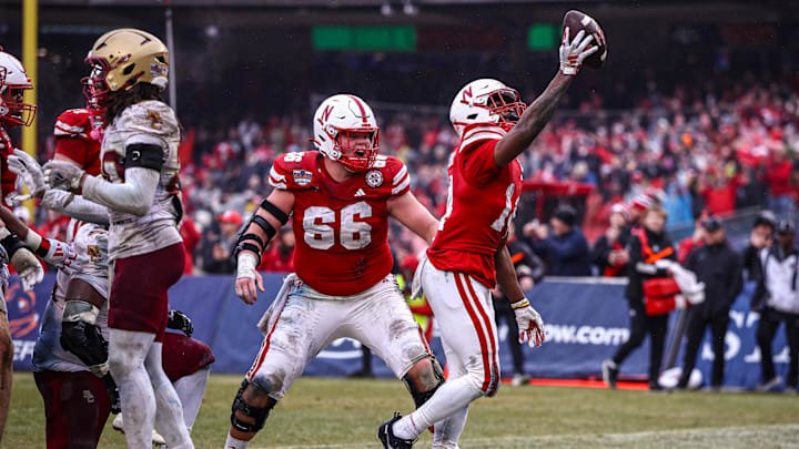 Nebraska running back Rahmir Johnson celebrates after scoring a touchdown in the 2014 Pinstripe Bowl. Nebraska running back Rahmir Johnson celebrates after scoring a touchdown in the 2014 Pinstripe Bowl.