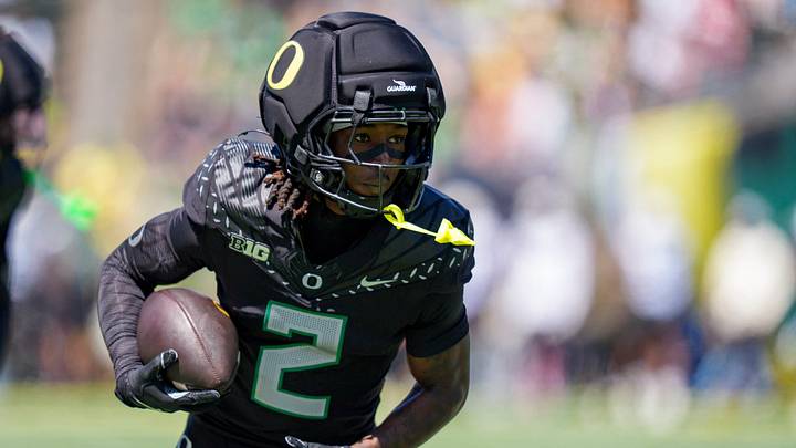 Combat Ducks wide receiver Iverson Hooks carries the ball during warmups during the Oregon Ducks annual spring game on April 25, 2026 at Autzen Stadium in Eugene, Oregon.