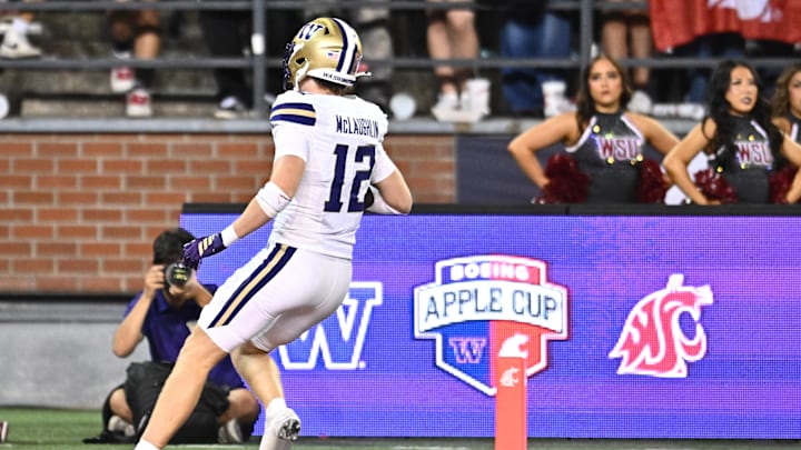 Sep 20, 2025; Pullman, Washington, USA; Washington Huskies safety Alex McLaughlin (12) returns an interception for a touchdown against the Washington State Cougars in the second half of Apple Cup at Gesa Field at Martin Stadium. Washington Huskies won 59-24. Mandatory Credit: James Snook-Imagn Images
