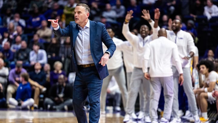 Jan 14, 2025; Baton Rouge, Louisiana, USA;  LSU Tigers head coach Matt McMahon points to forward Daimion Collins (10) after a play that sealed a victory over the Arkansas Razorbacks at Pete Maravich Assembly Center. Mandatory Credit: Stephen Lew-Imagn Images