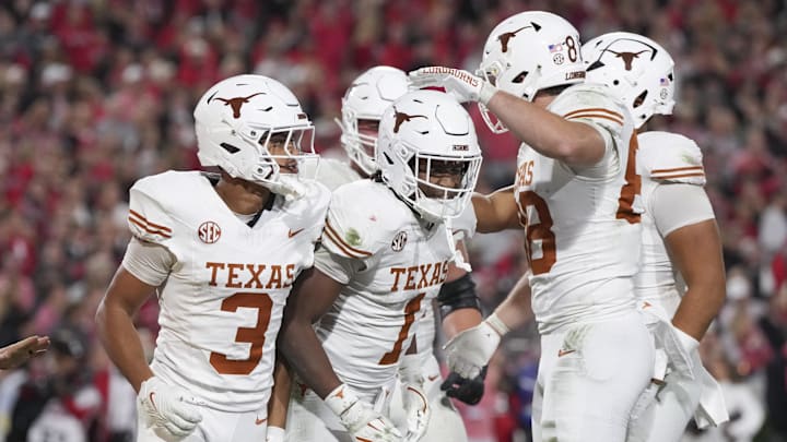 Texas Longhorns wide receiver Ryan Wingo celebrates scoring a touchdown with teammates in the second half against the Georgia Bulldogs