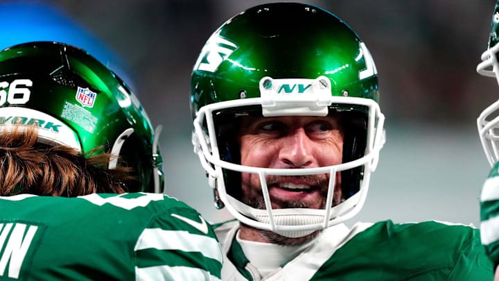New York Jets quarterback Aaron Rodgers (8) smiles after throwing his fourth touchdown pass of the day, Sunday January 5, 2025, in East Rutherford. New York Jets quarterback Aaron Rodgers (8) smiles after throwing his fourth touchdown pass of the day, Sunday January 5, 2025, in East Rutherford.