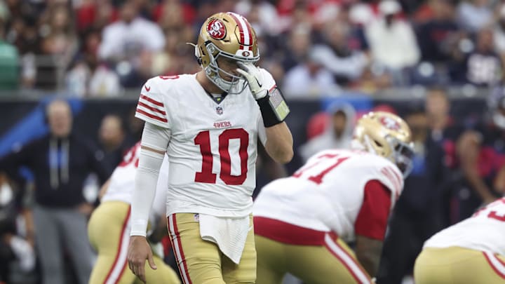 Oct 26, 2025; Houston, Texas, USA; San Francisco 49ers quarterback Mac Jones (10) walks off the field during the third quarter against the Houston Texans at NRG Stadium. Mandatory Credit: Troy Taormina-Imagn Images