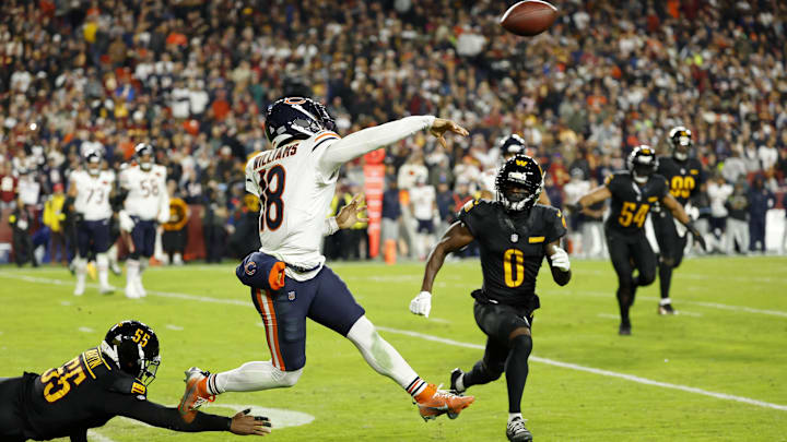 Caleb Williams throws on the run in the second half of Monday night's 25-24 Bears win over Washington.