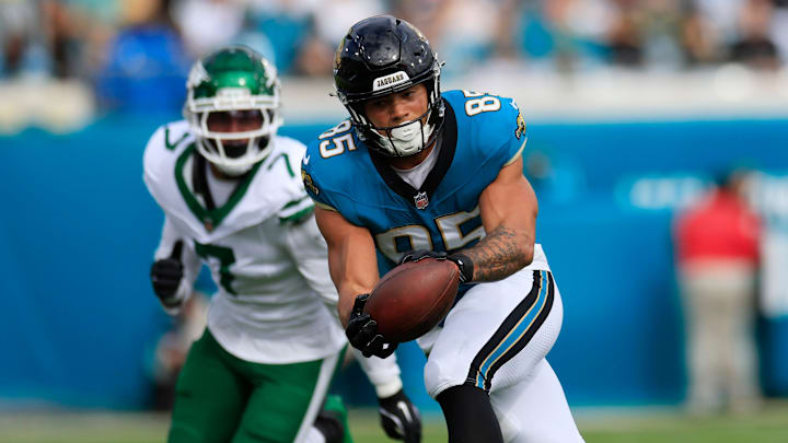 Jacksonville Jaguars tight end Brenton Strange (85) hauls in a reception against New York Jets defensive end Haason Reddick (7) during the first quarter Sunday, Dec. 15, 2024 at EverBank Stadium in Jacksonville, Fla. [Corey Perrine/Florida Times-Union]