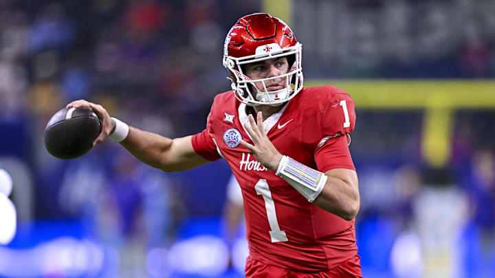 Dec 27, 2025; Houston, TX, USA; Houston Cougars quarterback Conner Weigman (1) warms up prior to the game against the Louisiana State Tigers at NRG Stadium. Mandatory Credit: Maria Lysaker-Imagn Images Dec 27, 2025; Houston, TX, USA; Houston Cougars quarterback Conner Weigman (1) warms up prior to the game against the Louisiana State Tigers at NRG Stadium. Mandatory Credit: Maria Lysaker-Imagn Images