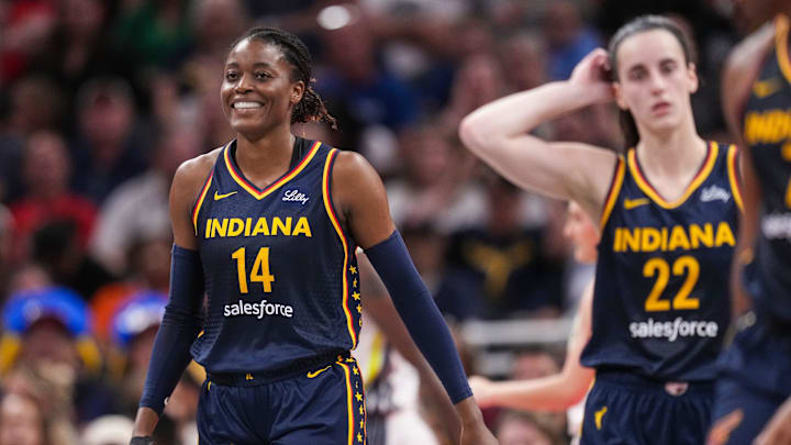 Indiana Fever center Temi Fagbenle (14) smiles after a foul called on her on Sunday, Sept. 15, 2024, during the game at Gainbridge Fieldhouse in Indianapolis. The Indiana Fever defeated the Dallas Wings, 110-109.