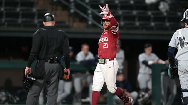 Mar 1, 2025; Stanford, CA, USA; Stanford Cardinal designated hitter Charlie Saum (21) gestures after hitting a home run against the Xavier Musketeers during the eighth inning at Sunken Diamond. Mandatory Credit: Darren Yamashita-Imagn Images