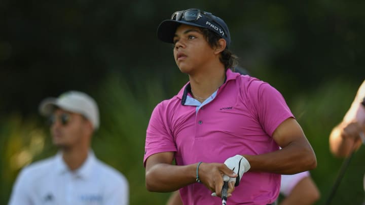 Charlie Woods, son of golf legend Tiger Woods, watches his drive off the 3rd tee at the USGA U.S.