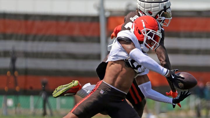 Cleveland Browns cornerback Greg Newsome II (0) nearly picks off a pass intended for wide receiver Jerry Jeudy (3) during NFL training camp at CrossCountry Mortgage Campus, Friday, Aug. 1, 2025, in Berea, Ohio.
