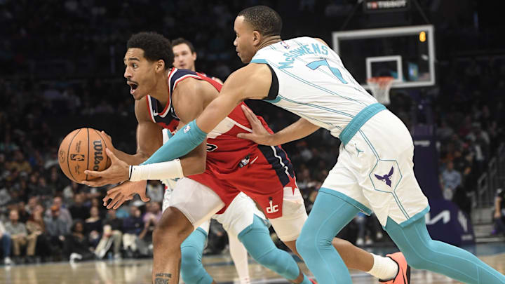 Nov 22, 2023; Charlotte, North Carolina, USA; Washington Wizards guard Jordan Poole (13) drives past
