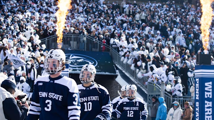Penn State ice hockey players enter Beaver Stadium for a top-five Big Ten game against Michigan State in Beaver Stadium. Penn State ice hockey players enter Beaver Stadium for a top-five Big Ten game against Michigan State in Beaver Stadium.