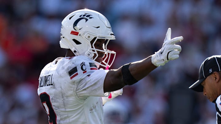 Cincinnati Bearcats wide receiver Jeff Caldwell (9) gestures after getting a first down in the third quarter of the NCAA football game between the Cincinnati Bearcats and Bowling Green Falcons at Nippert Stadium in Cincinnati on Sept. 6, 2025. Cincinnati Bearcats wide receiver Jeff Caldwell (9) gestures after getting a first down in the third quarter of the NCAA football game between the Cincinnati Bearcats and Bowling Green Falcons at Nippert Stadium in Cincinnati on Sept. 6, 2025.