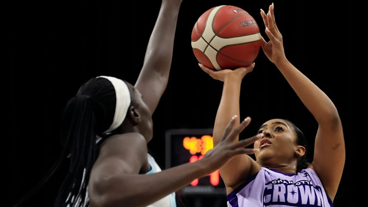 Charlotte Crown guard Deja Kelly (2), right, shoots the ball against Jacksonville Waves center Adut Bulgak (2) during the first quarter of an UpShot League women’s basketball game at VyStar Veterans Memorial Arena, Friday, May 15, 2026. in Jacksonville, Fla. Tonight marked the first home Waves game for the inaugural UpShot women’s professional basketball season. The Charlotte Crown held off the Jacksonville Waves 103-95.