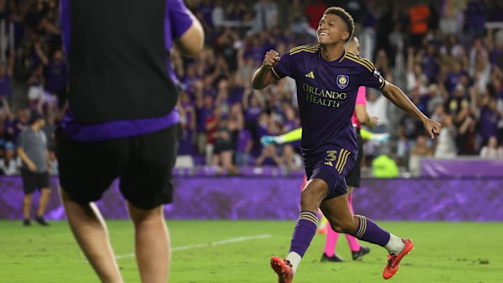 Nov 9, 2024; Orlando, Florida, USA; Orlando City defender Rafael Santos (3) celebrates scoring during a round of penalty kicks against the Charlotte FC in a 2024 MLS Cup Playoffs Round One match at Inter&Co Stadium. Mandatory Credit: Kim Klement Neitzel-Imagn Images