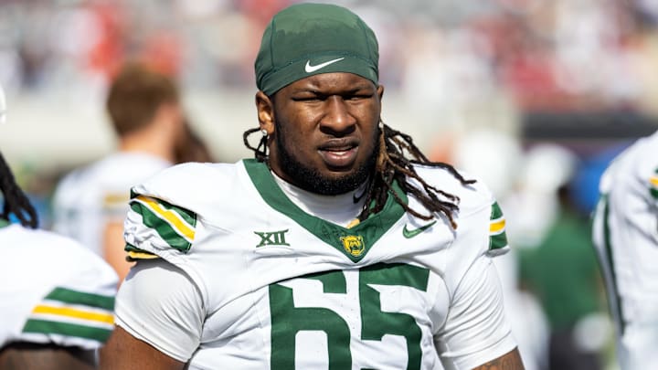 Nov 22, 2025; Tucson, Arizona, USA; Baylor Bears offensive lineman Sean Thompkins (65) against the Arizona Wildcats at Casino Del Sol Stadium. Mandatory Credit: Mark J. Rebilas-Imagn Images