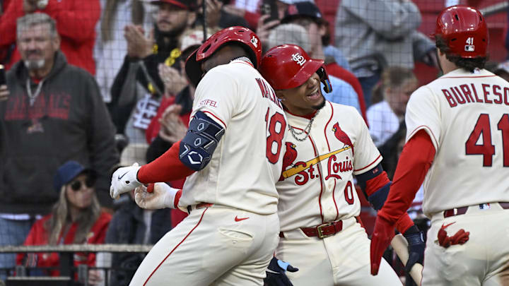 May 2, 2026; St. Louis, Missouri, USA; St. Louis Cardinals right fielder Jordan Walker (18) celebrates with St. Louis Cardinals shortstop Masyn Winn (0) after hitting a two-run home run against the Los Angeles Dodgers in the third inning at Busch Stadium. Mandatory Credit: Joe Puetz-Imagn Images