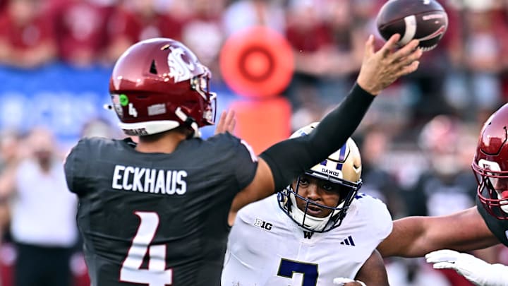 Sep 20, 2025; Pullman, Washington, USA; Washington Huskies linebacker Taariq Al-Uqdah (3) tries to get to Washington State Cougars quarterback Zevi Eckhaus (4) in the first half of Apple Cup at Gesa Field at Martin Stadium. Mandatory Credit: James Snook-Imagn Images