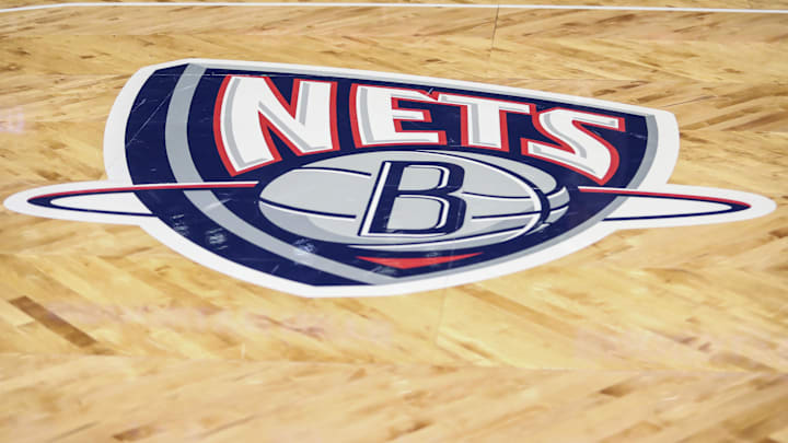 Nov 17, 2021; Brooklyn, New York, USA; The old Nets logo on the court prior to the game between the Cleveland Cavilers and the Brooklyn Nets at Barclays Center. Mandatory Credit: Wendell Cruz-Imagn Images Nov 17, 2021; Brooklyn, New York, USA; The old Nets logo on the court prior to the game between the Cleveland Cavilers and the Brooklyn Nets at Barclays Center. Mandatory Credit: Wendell Cruz-Imagn Images