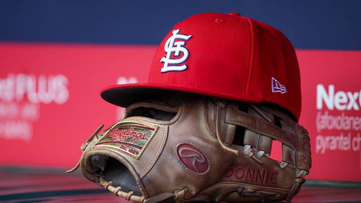 Apr 21, 2025; Atlanta, Georgia, USA; A St. Louis Cardinals hat and glove in the dugout against the Atlanta Braves in the first inning at Truist Park. Mandatory Credit: Brett Davis-Imagn Images Apr 21, 2025; Atlanta, Georgia, USA; A St. Louis Cardinals hat and glove in the dugout against the Atlanta Braves in the first inning at Truist Park. Mandatory Credit: Brett Davis-Imagn Images