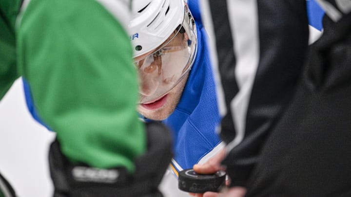 Jan 23, 2026; Dallas, Texas, USA; St. Louis Blues center Brayden Schenn (10) prepares to take the face-off against the Dallas Stars during the first period at the American Airlines Center. 