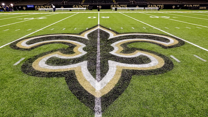 Oct 30, 2022; New Orleans, Louisiana, USA;  General view of the New Orleans Saints logo as the midfield logo fleur-de-lis after the game between the New Orleans Saints and the Las Vegas Raiders at Caesars Superdome. Mandatory Credit: Stephen Lew-Imagn Images