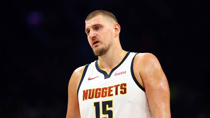 Nov 29, 2025; Phoenix, Arizona, USA; Denver Nuggets center Nikola Jokic (15) against the Phoenix Suns in the first half at the Mortgage Matchup Center. Nov 29, 2025; Phoenix, Arizona, USA; Denver Nuggets center Nikola Jokic (15) against the Phoenix Suns in the first half at the Mortgage Matchup Center.