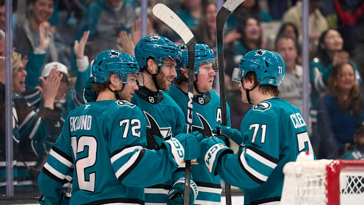 Jan 10, 2026; San Jose, California, USA; San Jose Sharks center Alexander Wennberg (21) celebrates with left wing William Eklund (72), center Tyler Toffoli (73) and center Macklin Celebrini (71) after scoring a goal during the second period at SAP Center at San Jose. Mandatory Credit: Robert Edwards-Imagn Images