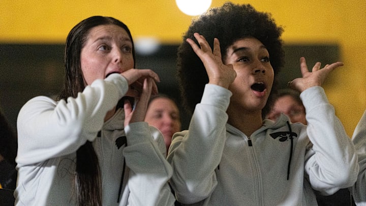 Iowa guard Taylor McCabe and Iowa forward Hannah Stuelke react during a watch party for the NCAA Tournament bracket reveal March 15, 2026 at Carver-Hawkeye Arena in Iowa City, Iowa.