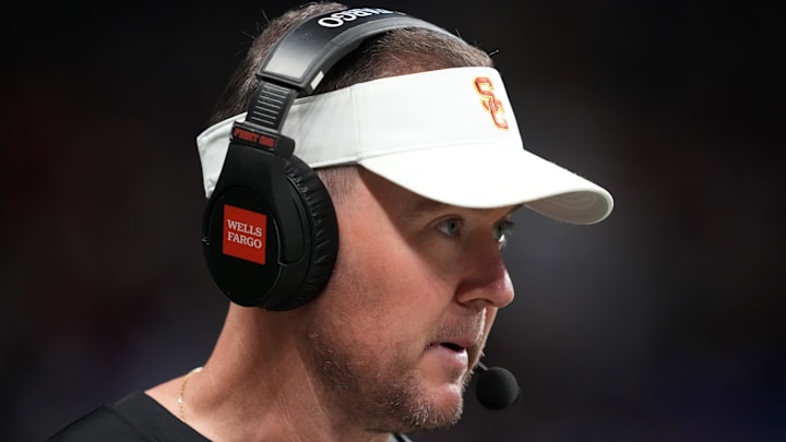 Dec 30, 2025; San Antonio, TX, USA; Southern California Trojans head coach Lincoln Riley watches in the first half against the TCU Horned Frogs during the Alamo Bowl at Alamodome. Mandatory Credit: Kirby Lee-Imagn Images