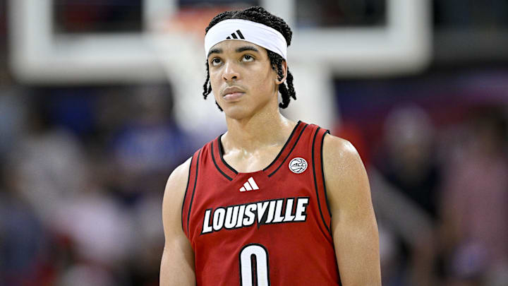 Feb 17, 2026; Dallas, Texas, USA; Louisville Cardinals guard Mikel Brown Jr. (0) looks on during the second half against the SMU Mustangs at Moody Coliseum. Feb 17, 2026; Dallas, Texas, USA; Louisville Cardinals guard Mikel Brown Jr. (0) looks on during the second half against the SMU Mustangs at Moody Coliseum.