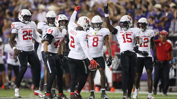 Oct 4, 2024; Fort Worth, Texas, USA; Houston Cougars defensive back A.J. Haulcy (2) celebrates making an interception against the TCU Horned Frogs with his teammates in the second quarter at Amon G. Carter Stadium. Mandatory Credit: Tim Heitman-Imagn Images Oct 4, 2024; Fort Worth, Texas, USA; Houston Cougars defensive back A.J. Haulcy (2) celebrates making an interception against the TCU Horned Frogs with his teammates in the second quarter at Amon G. Carter Stadium. Mandatory Credit: Tim Heitman-Imagn Images