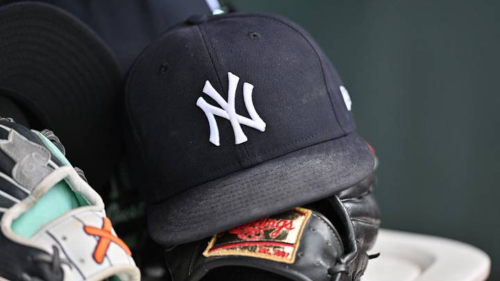 Aug 2, 2026; Chicago, Illinois, USA; A detail view of a New York Yankees baseball hat and a glove during the eighth inning against the Chicago Cubs at Wrigley Field. Mandatory Credit: Patrick Gorski-Imagn Images Aug 2, 2026; Chicago, Illinois, USA; A detail view of a New York Yankees baseball hat and a glove during the eighth inning against the Chicago Cubs at Wrigley Field. Mandatory Credit: Patrick Gorski-Imagn Images