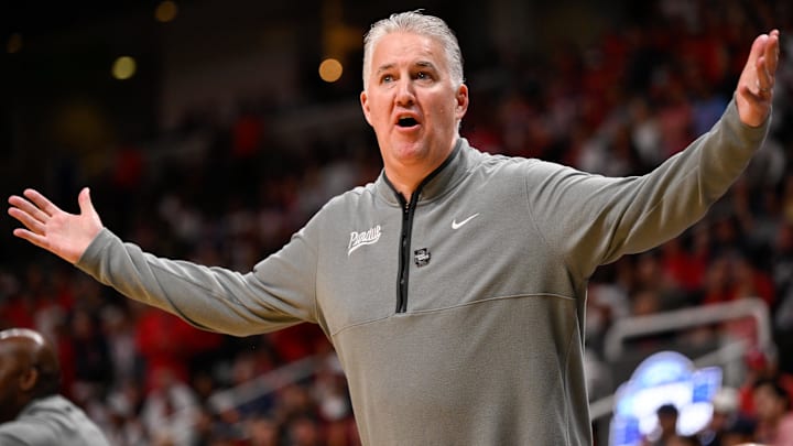Purdue Boilermakers head coach Matt Painter reacts in the first half against the Arizona Wildcats. Purdue Boilermakers head coach Matt Painter reacts in the first half against the Arizona Wildcats.